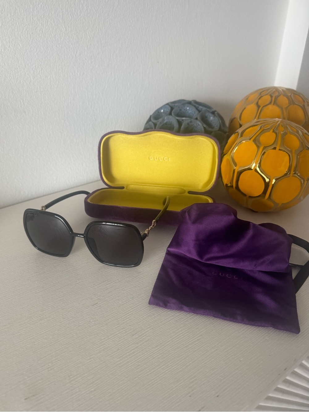 Gucci Women's Black Square Sunglasses with Gold Chain Temples
